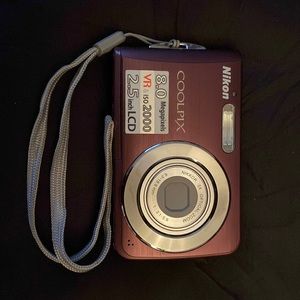 Nikon digital camera with case in original box.